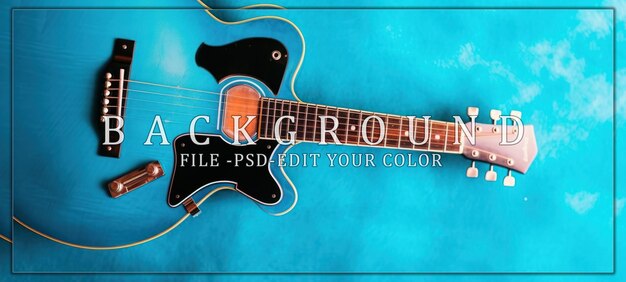 A Blue Acoustic Guitar on a Cyan Background