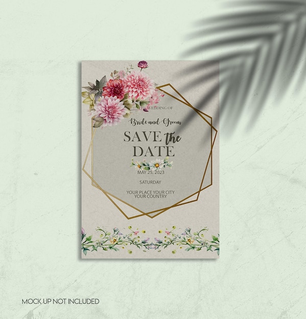 A book with flowers on it that says save the date.