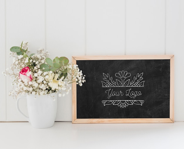 Bouquet of flowers and chalkboard mock-up