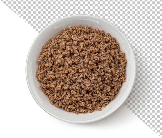 Bowl of buckwheat flakes isolated on white background top view