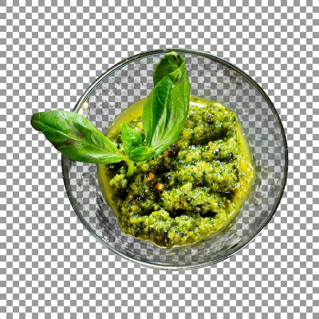 Bowl of green pesto with leaves on transparent background