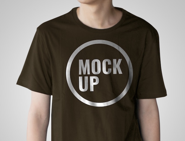 Boy wearing brown shirt with mockup