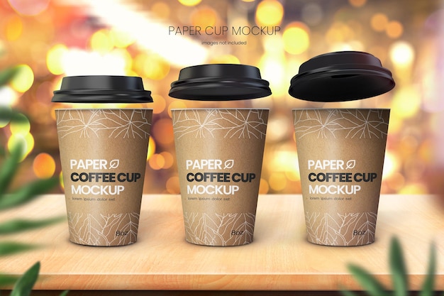 Bright coffee cup mockup of three cups on wooden tabletop with bokeh background