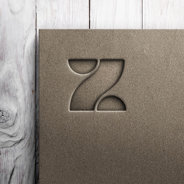 a brown piece of wood with a letter z on it