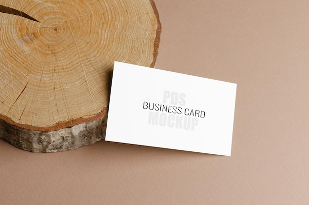 Business card blank mockup on wood and paper