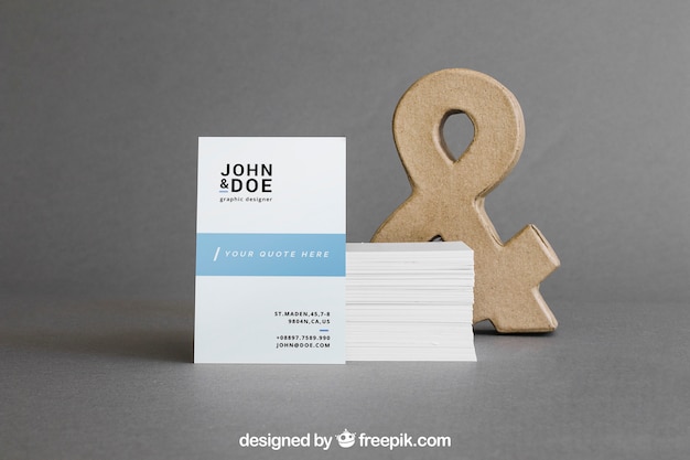 Business card mockup with stack in front of ampersand