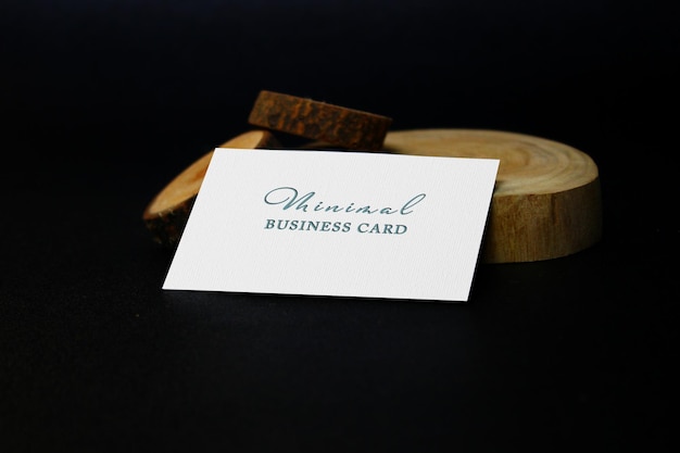 Business card on a wooden piece of wood