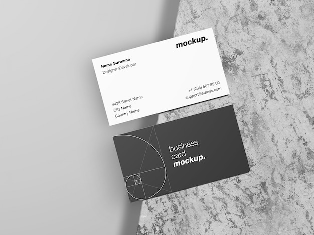 Business cards on a grunge concrete mockup template