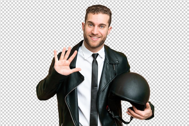 Business man with a motorcycle helmet over isolated chroma key background counting five with fingers