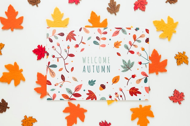 Canadian dried leaves with welcome autumn quote