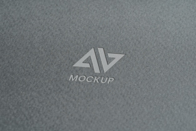 Capital letter mock-up logo design on minimalist grey paper