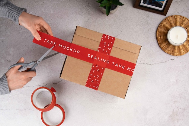 Cardboard box with sealing tape mock-up design