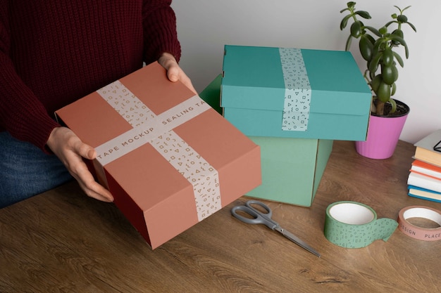 Cardboard box with sealing tape mock-up design