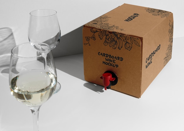 Cardboard wine dispenser with glass