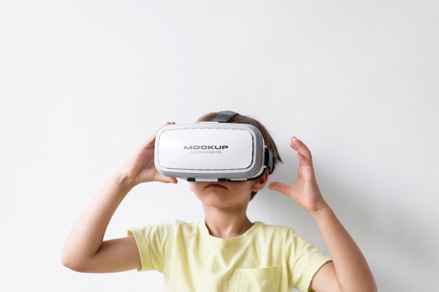 Child wearing vr glasses mockup