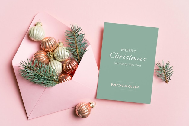 Christmas eve card mockup on pink with festive decorations