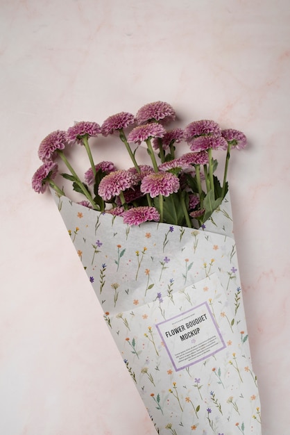 PSD chrysanthemum bouquet with wrapping paper mock-up