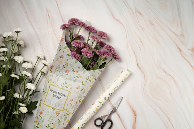 PSD chrysanthemum bouquet with wrapping paper mock-up