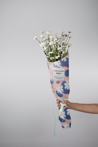 PSD chrysanthemum bouquet with wrapping paper mock-up