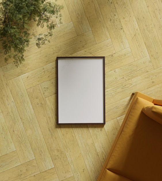 cinematic shot of wooden frame mockup poster on the floor with orange sofa in the modern living room