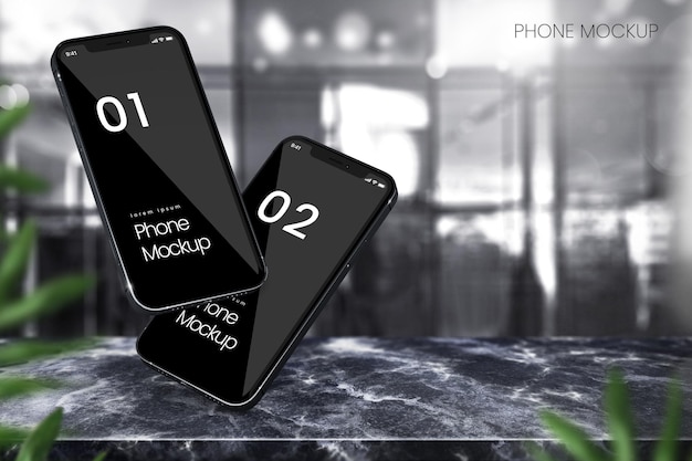 Classic phone mockup of two smartphones on black marble background