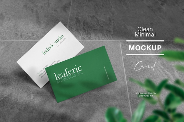 Clean minimal business card mockup on stone floor and light shadow.