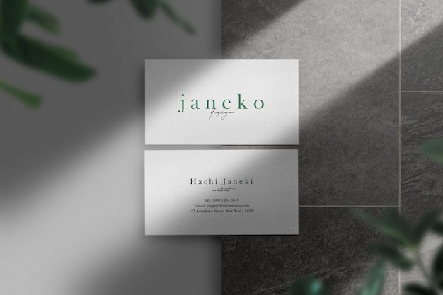 Clean minimal business card mockup on stone plate 