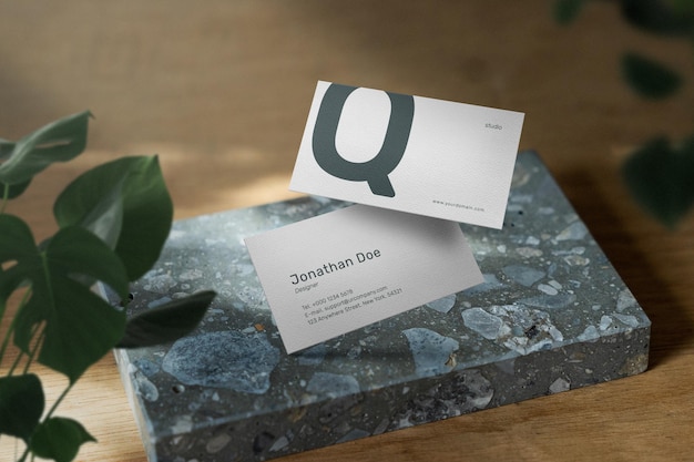 Clean minimal business card mockup on wooden plate 