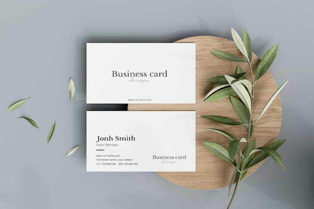 Clean minimal business card with leafs mockup