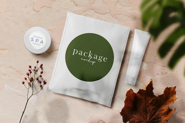 Clean minimal packaging mockup on cement background with jar tube leaf and plant