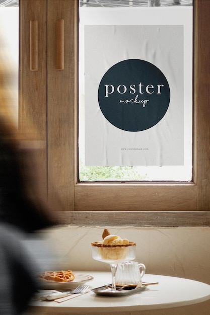 Clean minimal poster mockup on glass cafe background with dessert and people walking pass