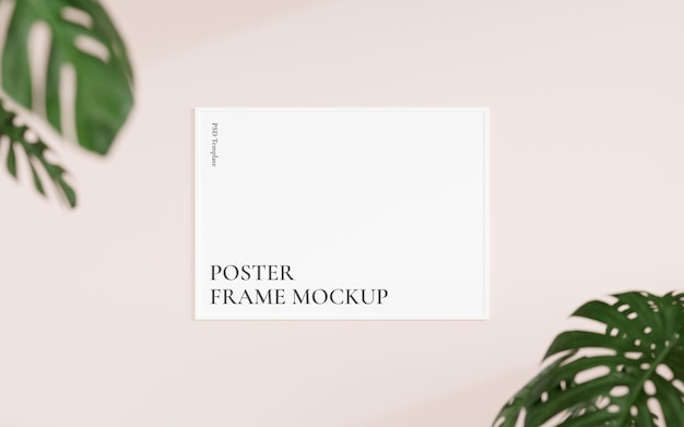 Clean and minimalist front view horizontal white photo or poster frame mockup hanging on the wall with blurry plant 3d rendering