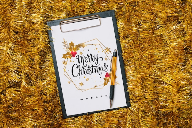 Clipboard mockup with christmas decoration