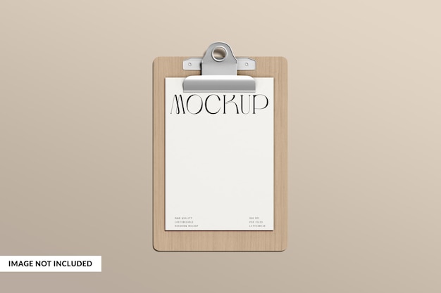 Clipboard with a white paper on it that says mockup.