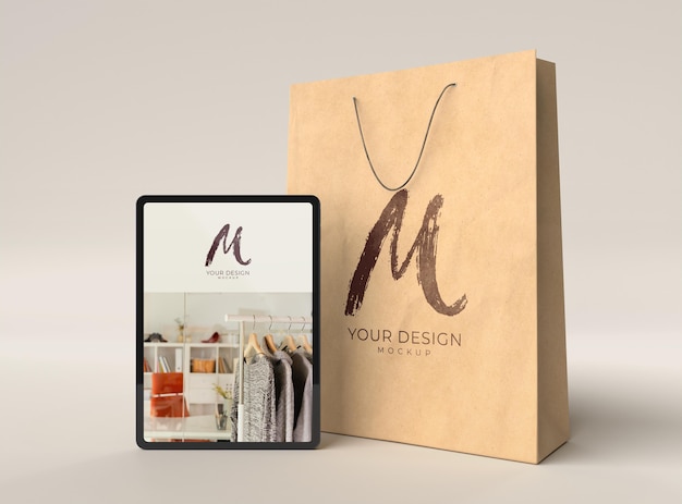 Close up on shopping bag with digital device mockup