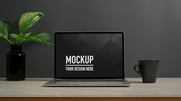 Close up view of workspace with laptop mockup