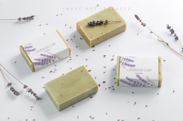 Closeup of natural herbal soap mockup with lavender flowers