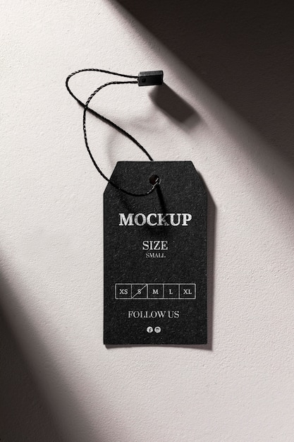 Clothing black size tag mock-up with shadows