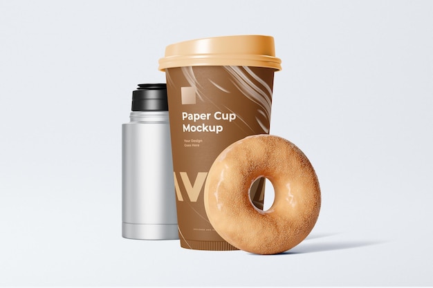 A coffee cup and a donut container are on display.