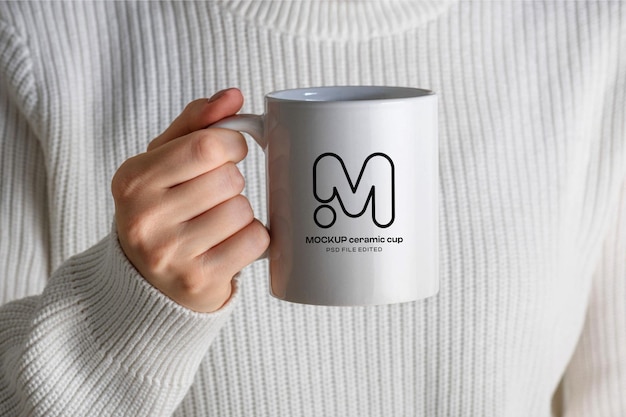 PSD coffee mug mockup with arm