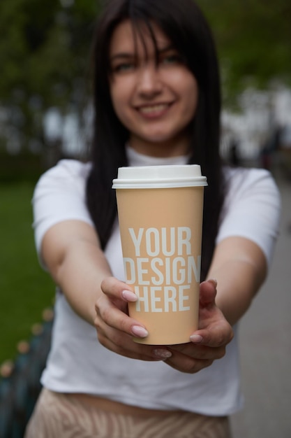 Colored paper coffee cup on the table mockup custom design changeable color closeup