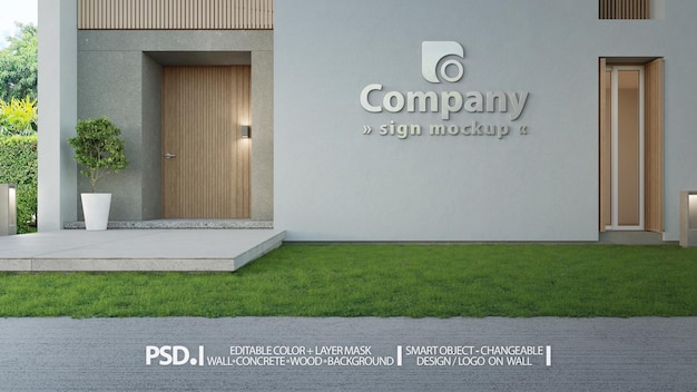 Company sign and logo PSD mockup on concrete wall facade of modern building entrance