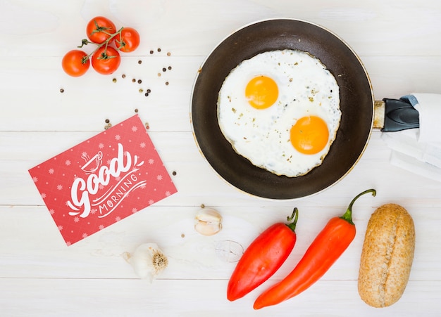 Composition of morning fried eggs with ingredients