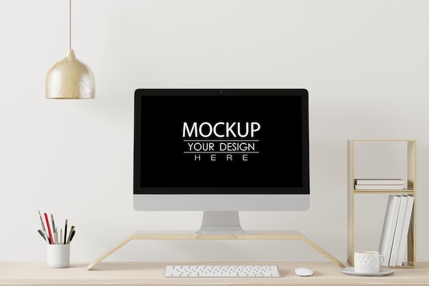 Computer on table in workspace mockup