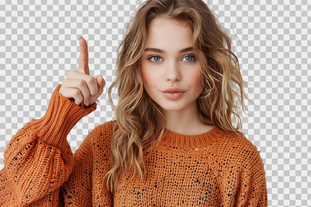 Confident woman dressed orange sweater pointing finger empty space on isolated transparent background