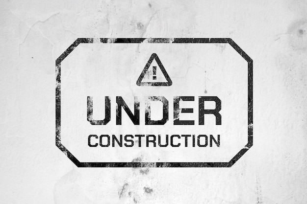 Under construction grunge text effect