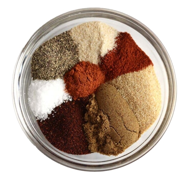 a container of spices with a white background with a red triangle on the top