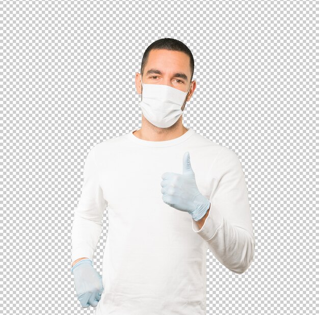 Coronavirus.Young man doing concepts and wearing mask and protective gloves