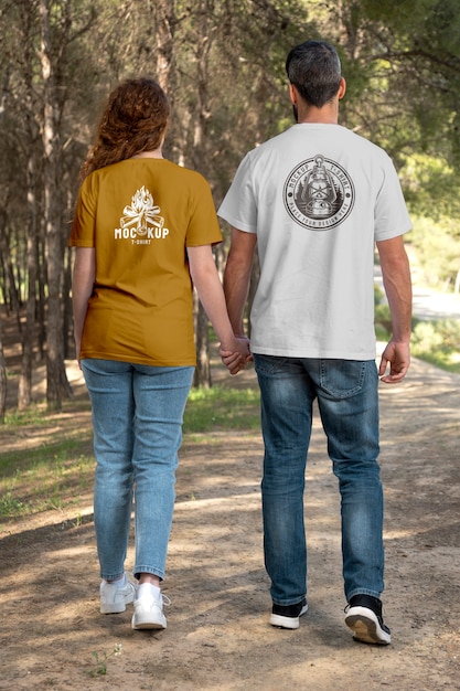 Couple outdoors in nature wearing t-shirts mock-up