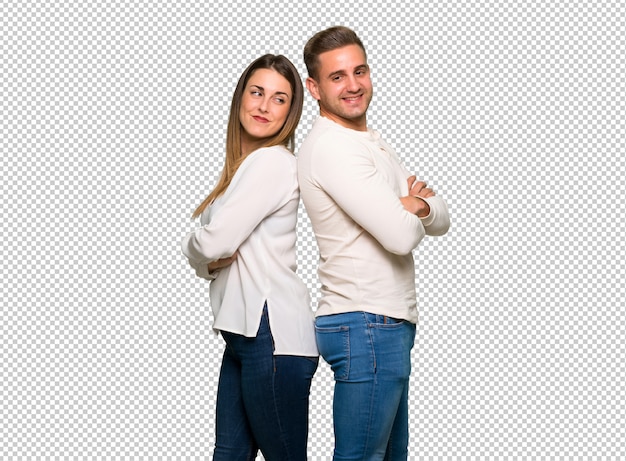 Couple in valentine day keeping the arms crossed looking at each other